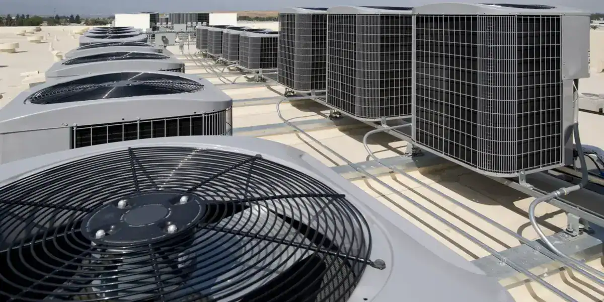 Industrial air conditioners on building rooftop